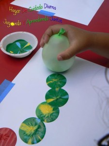 This one has all kinds of possibilities based on how you mix the paint and how much you 'squish' the balloon in printing.  I love the element of chance involved! Click for source.